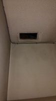 hole in boiler cupboard ceiling.jpg