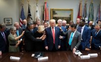 Evangelical-Hands-on-Trump-04.jpg