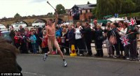 The-man-ran-past-crowds-naked-carrying-a-fake-Olympic-torch-in-upmarket-Henley-on-Thames.jpg