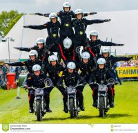 pyramid-stunt-motorbike-riders-white-helmets-group-specially-trained-british-army-who-perform-...jpg