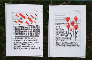 bombs and flowers and Russian writing in red and black on paper form.png