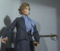 Thatcher waxwork impaled with sword