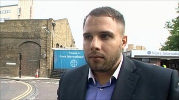 DAN WOOTTON CRYING OUTSIDE NEWS INTERNATIONAL WAPPING CLOSURE OF NOTW.jpg