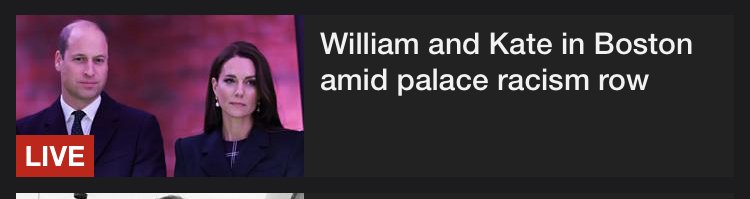 A screen grab of the BBC News website shows a thumbnail of Will and Kate looking solemn. A flash says “LIVE”.  The headline reads “William and Kate in Boston amid palace racism row”. 