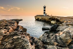 colonia-de-sant-jordi-lighthouse-mallorca-colonia-de-sant-jordi-lighthouse-silhouette-two-peop...jpg