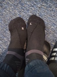 Picture of my socks which are labelled L and R, but I'm wearing them on the opposite feet.