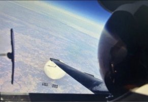 A U-2 pilot looks down on the Chinese balloon. The shadow of his aircraft can be seen on the balloon’s fabric.