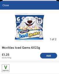 A screenshot from the Tesco app shows a packet of McVities Iced Gems. They come in a packet containing six smaller bags and cost £1.25. The packaging features a cartoon polar bear. The confection is vegetarian. 