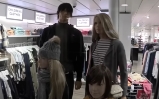 still from a video showing a tasteful black and white striped top in a shop on board a North Sea ferry