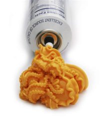 American squirty cheese being squirted out of an aerosol looking like bright orange nastiness from Hades! 