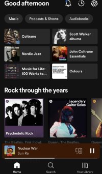 Screenshot of my Spotify Home Screen showing my listening habits (mainly jazz, but a bit of Scott Walker and jazz).  They want me to consider classic guitar solos…