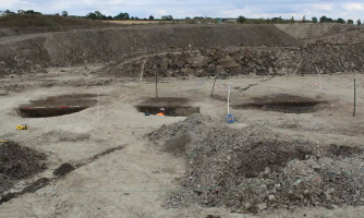 three pits in alignment at the dig site