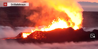 volcanic eruption in Iceland showing lava fountaining out of a fissure