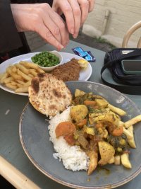 As described above. Veg curry, half and half, naan. Mrs La Rouge is having fish and chips. We’re in the courtyard of the Cwtch Cafe, Builth. 