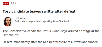 BBC item with headline 'tory candidate leaves swiftly after defeat' with text 'the conservative candidate Festus Akinbusoye arrived on stage at the last minute.  He left immediately after the Mid Bedfordshire result was announced'