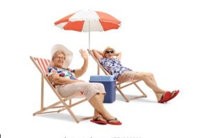 elderly-couple-on-holiday-sitting-260nw-1774802282.jpg