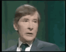 Kenneth Williams pulls a face as if to say “ooh Matron!”.