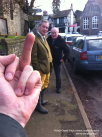 This is the lovely Nigel Farage. The photographer gave him a message before he went to support...png