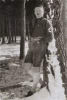 Hitler looking faintly ridiculous in lederhosen & long socks (1).jpg