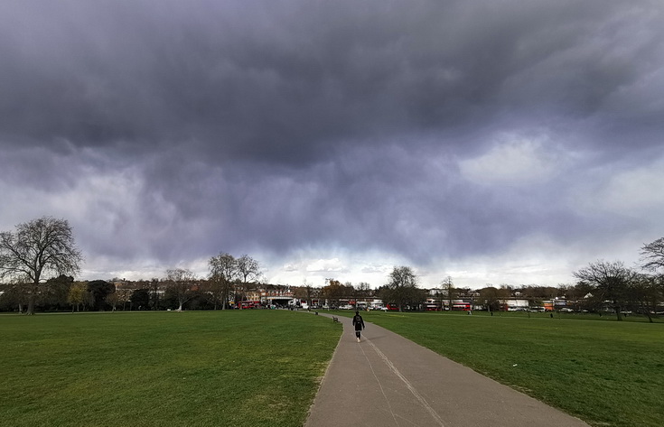 Dramatic skies and some April snow in Brockwell Park - in photos