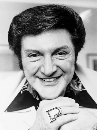 liberace-pianist-and-entertainer-wears-gold-ring-that-an-indian-chief-gave-him.jpg