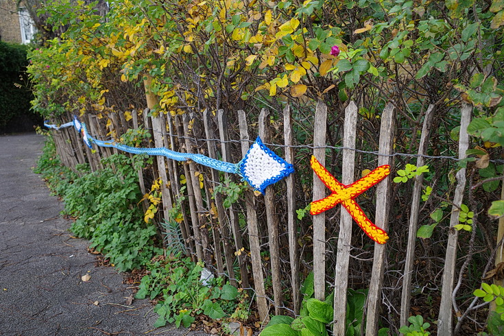 In photos: Guerrilla knitting delivers positive messages in Slade Gardens