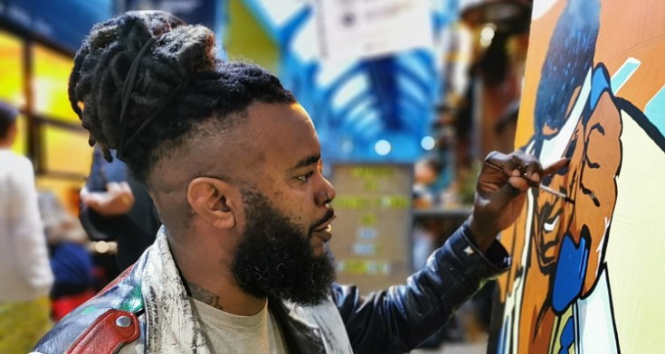 Artist at work: Mark Anthony paints in the Brixton Village, Sept 2020 