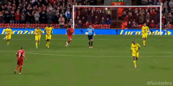 Daniel-Agger-Knocks-Ball-out-of-Goalkeepers-hands.gif