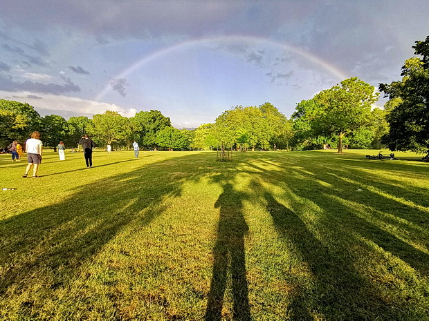 Dancing in the rain - a sudden rain storm in Brockwell Park, south London