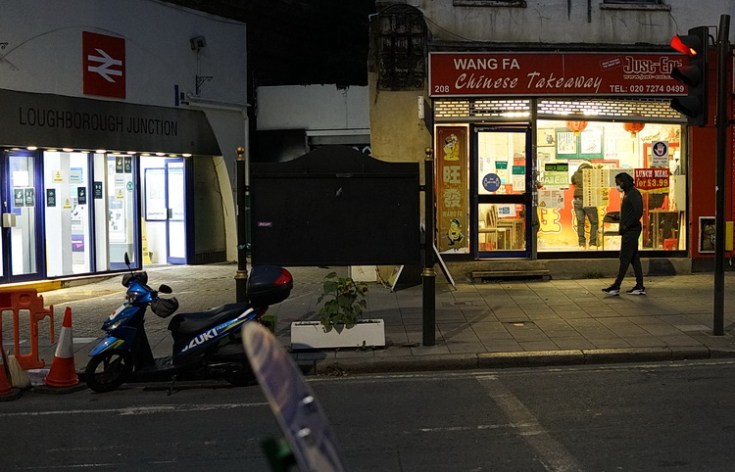 Loughborough Junction at night: shop fronts, signs and street scenes