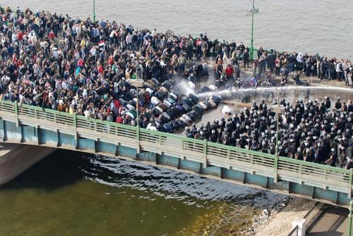 water_cannon_prayer_egypt_Jan_28.jpg