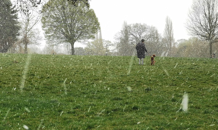 Dramatic skies and some April snow in Brockwell Park - in photos