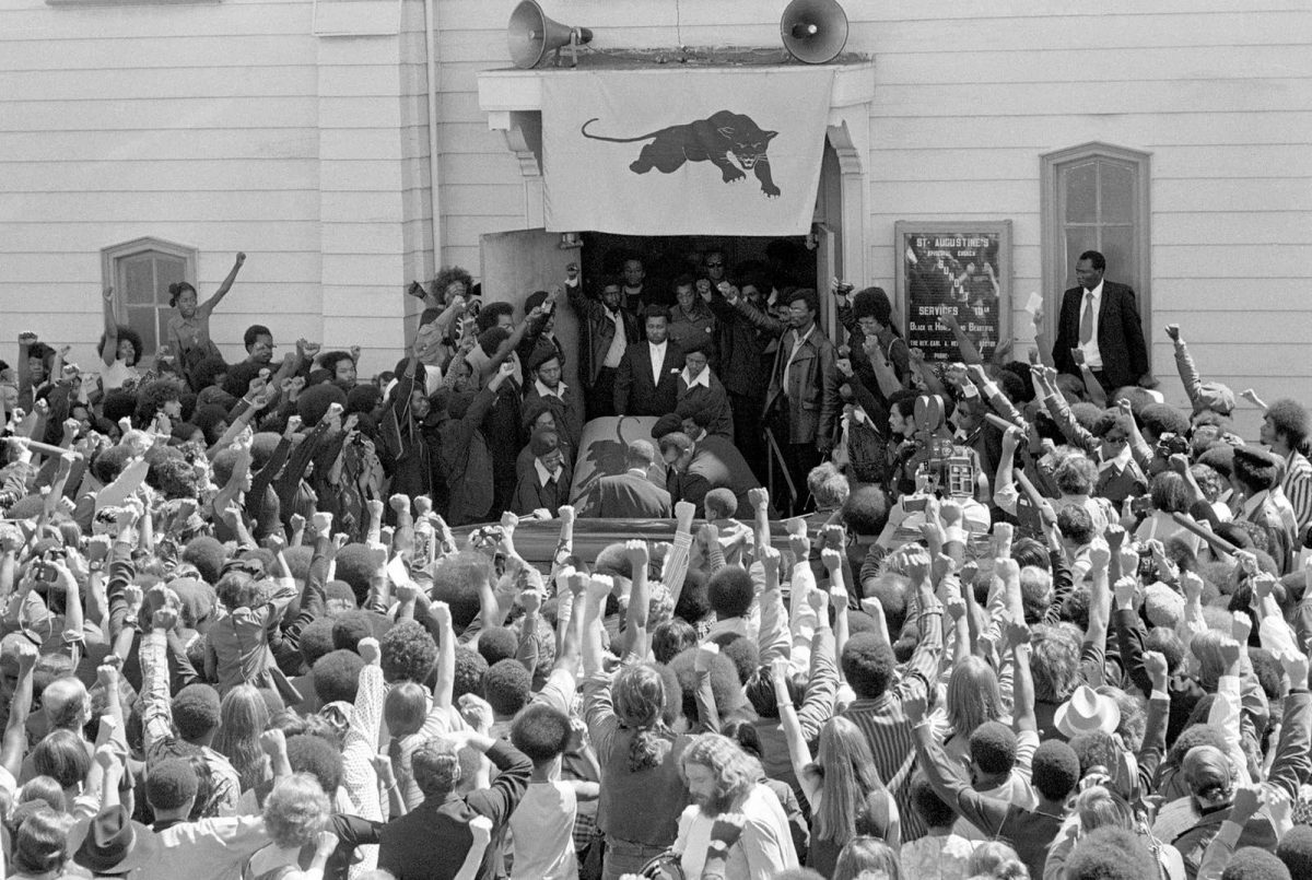 Mourners-give-the-black-power-salute-as-Black-Panther-George-Jackson-is-carried-from-St.-Augustines-Church-in-Oakland-Aug.-28-1971-1200x805.jpg