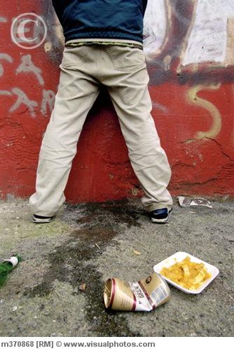 drunk_man_urinating_against_a_wall_m370868.jpg