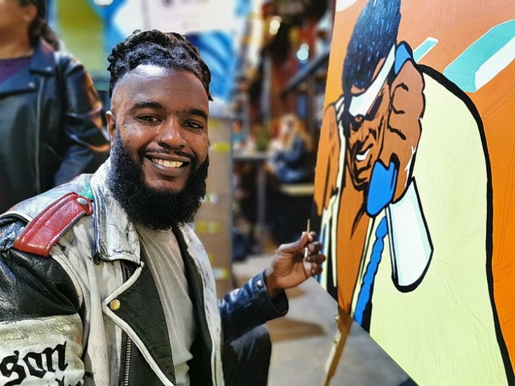 Artist at work: Mark Anthony paints in the Brixton Village, Sept 2020 