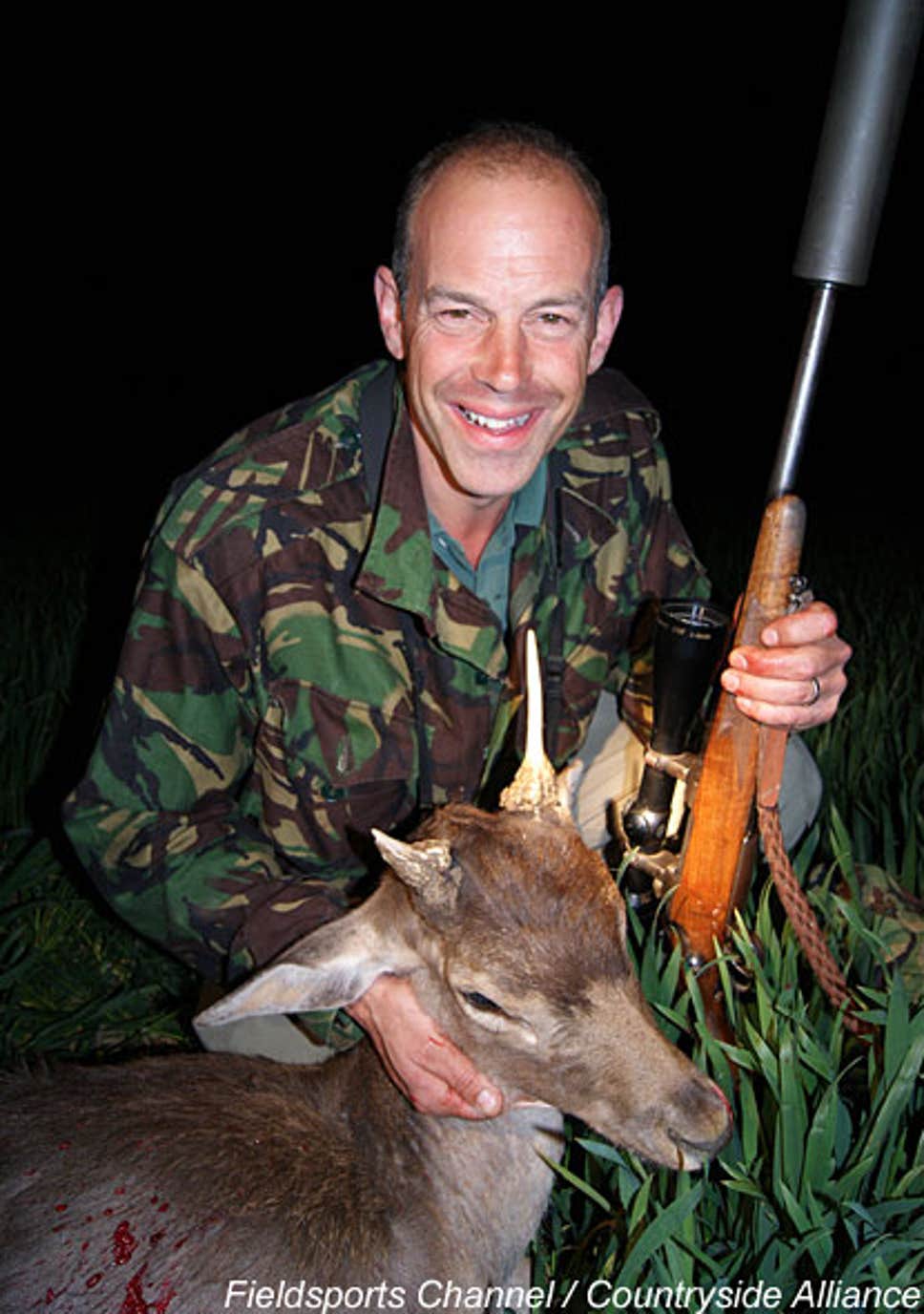 Huntsman: Location, Location, Location host Phil Spencer grins with a deer carcass