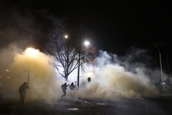 Law enforcement deployed tear gas Wednesday at a protest outside an Immigration and Customs Enforcement building in Portland, Ore.