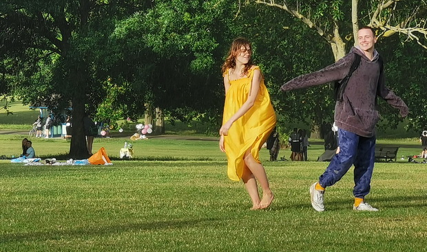 Dancing in the rain - a sudden rain storm in Brockwell Park, south London