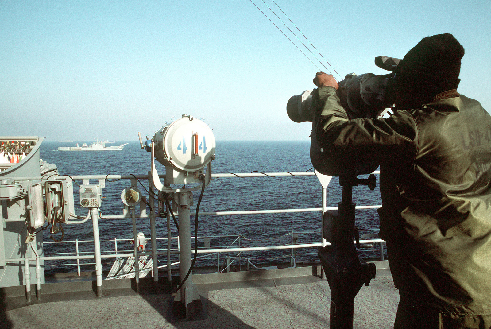 signalman-roderick-powell-observes-two-tank-landing-ships-through-binoculars-37172b-1600.jpg