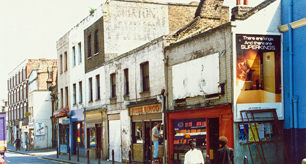 Brixton history: Coldharbour Lane in 1987, ghost sign, cafe, taxi and prize bingo where the Satay Bar now stands