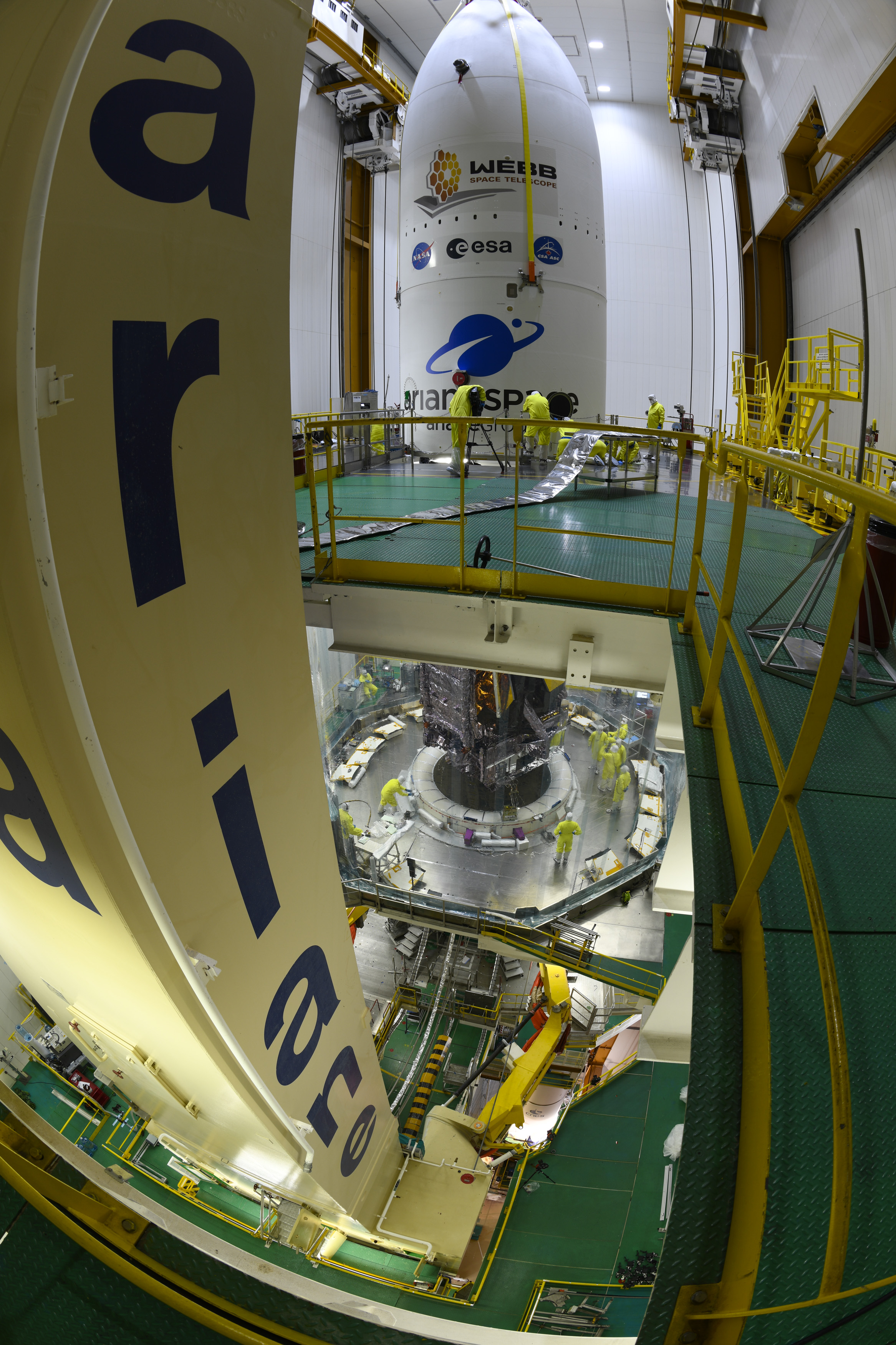 JWST encapsulation in the launch fairing nearing completion.