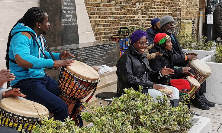 In photos: The drummers under the Bovril sign, Windrush Square, Brixton