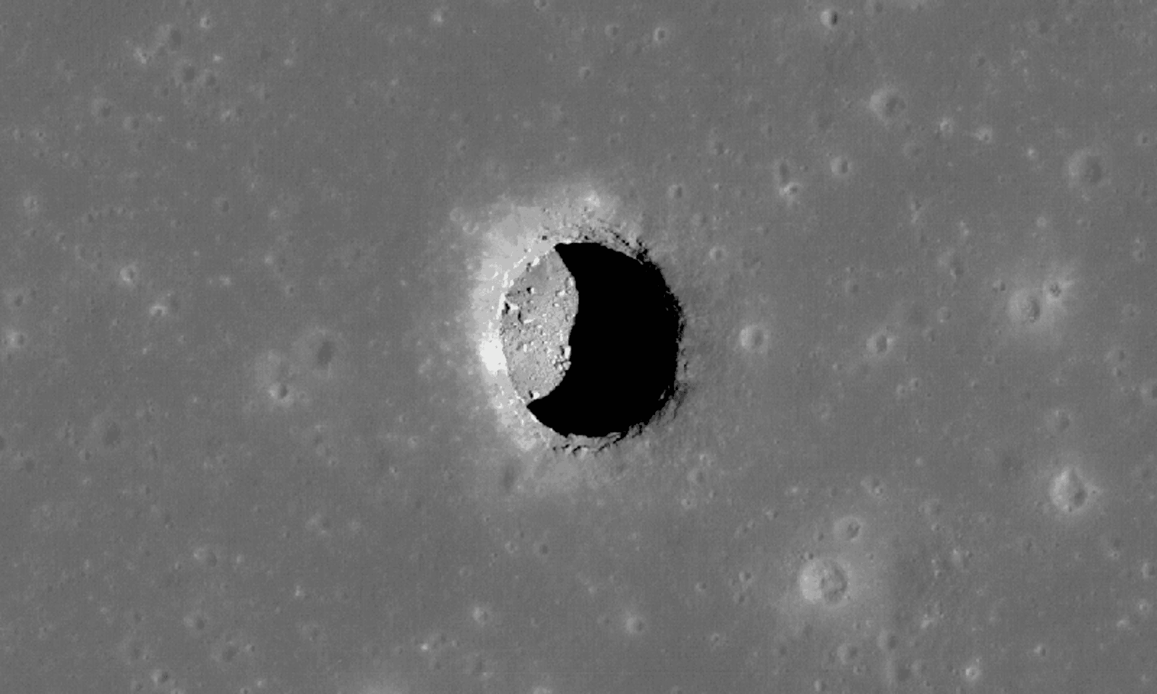 a cave entrance on the surface of the Moon